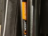 two baseball bats that are sitting in a bag