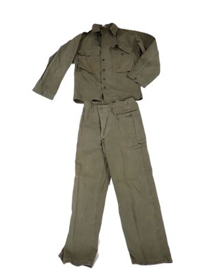 an image of a military uniform is shown on a white background
