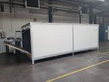 an image of a large white container in a warehouse