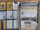 a box full of books and papers on a table