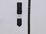 a close up of a watch and a ruler on a white surface