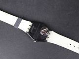 an image of a white and black watch on a black surface