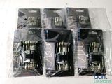 six packs of screws in plastic bags sitting on a table