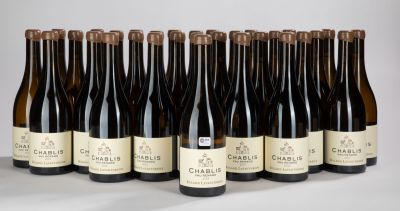 six bottles of wine are lined up in a row on a table