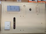 a box with a remote control on top of it