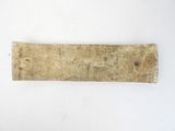 an old piece of stone with a small hole in the middle of it