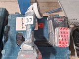 an image of a corded drill and other tools