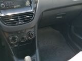 the interior of a car with a steering wheel and dashboard controls
