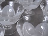 a lot of empty wine glasses sitting on a table