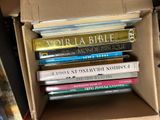 a box full of books sitting on a table