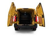 the back end of a yellow van with its doors open