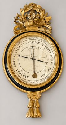 a clock that is hanging on the wall in the room