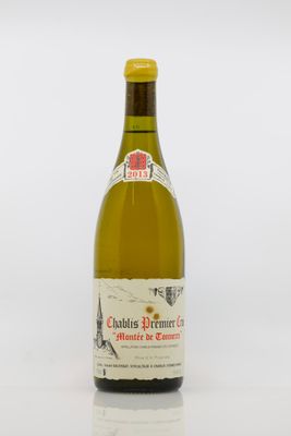 a bottle of wine that is sitting on a table