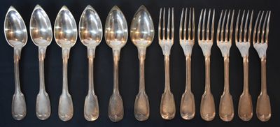 a lot of spoons and forks on the table