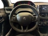 the interior of a car with a steering wheel and dashboard controls