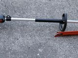 an image of a string trimmer on the ground