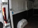 a white van that is parked in a garage