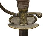 an image of a sword with a handle on a plate