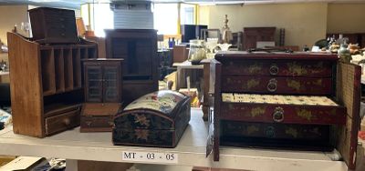 many pieces of furniture on a shelf in a room