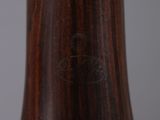 a close up of a vase on a table