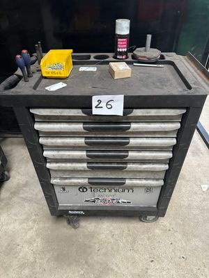 a close up of a tool box with a lot of tools on it