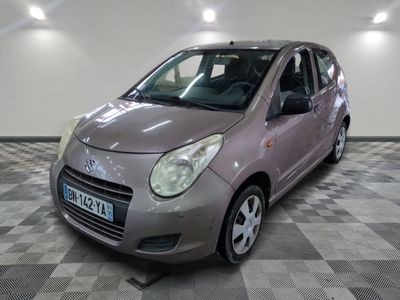 a picture of a small car parked in a garage