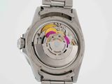 an image of a silver watch with a rainbow dial on a bracelet
