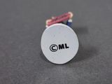 a picture of a small white button with the word oml on it