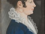 portrait of a woman in a blue dress with a white lace collar