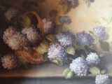 a painting of a basket of flowers on a table