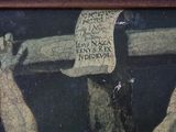 a painting of a man holding a cross with a piece of paper on it