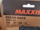 two boxes of maxxis rekon race tires on a table