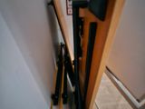 a pair of skis and a pair of ski poles on the stairs