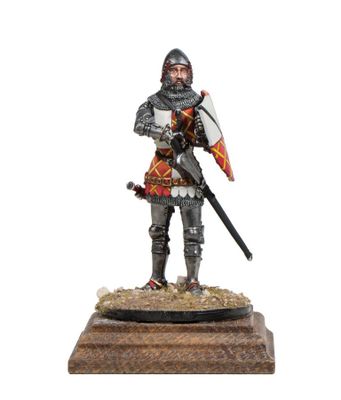 a figurine of a man in armor holding a sword