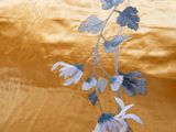 a picture of a close up of a vase with flowers on it