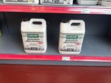 three gallons of detere on the shelf in the store