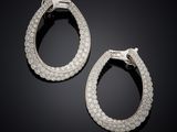 a pair of diamond hoop earrings
