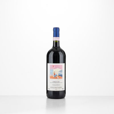 a bottle of red wine sitting on top of a table