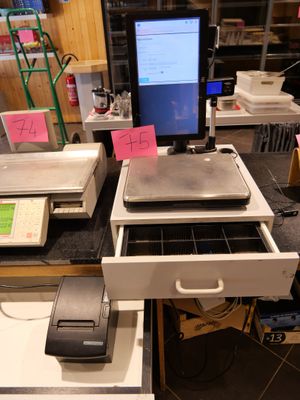 an image of a desk with a computer and a printer on it