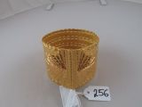 a gold basket with a price tag attached to it