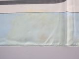 a close up of a piece of cloth with a cat on it
