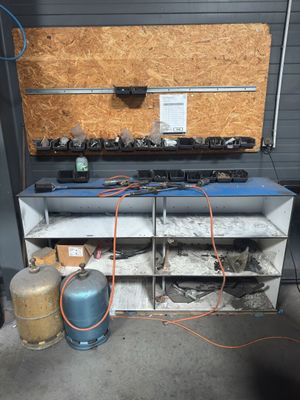 an image of a work bench with a lot of tools on it
