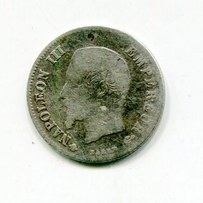 an old coin with a man ' s face on it