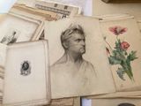 a lot of old books on a table with a picture of a man