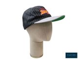 the hat is on a mannequin head with a black and white striped visor