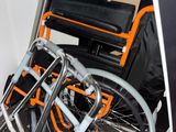 a wheelchair that is sitting in the corner of a room