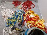 a pile of yarn and other items on the floor