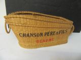 a basket that has a sign on it that says chasson perretils