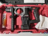 a drill in a case with a cloth in it