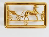 gold plated brooch depicting a horse and carriage with a man in a carriage